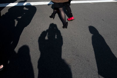Low section of people on road
