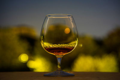 Close-up of wineglass on table
