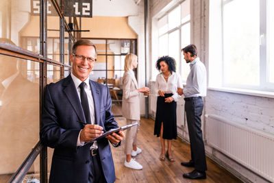 Business colleagues working in office