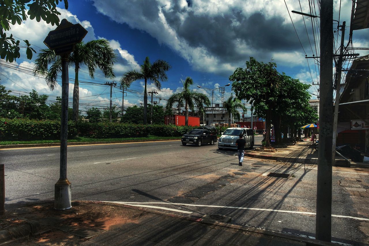 CARS ON STREET IN CITY