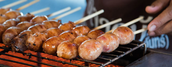 Close-up of meat on barbecue grill