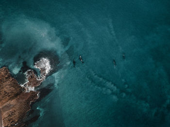 High angle view of people on sea shore