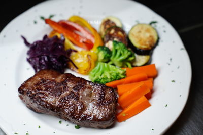 Close-up of food served on table