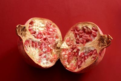 Close-up of ice cream over red background