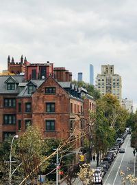 Buildings in city against sky