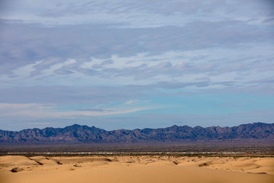 Scenic view of desert against sky