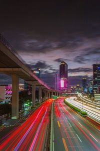 High angle view of light trails on road at night