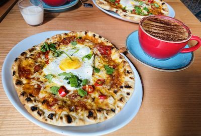 High angle view of breakfast served on table