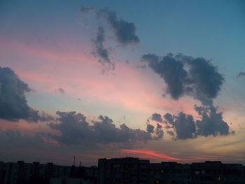 Cityscape against sky during sunset