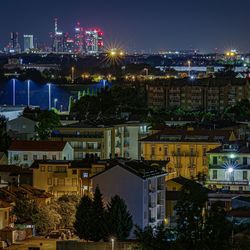 High angle view of illuminated buildings at night