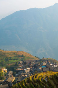 High angle view of townscape and mountains