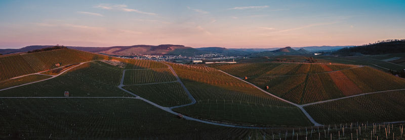 Scenic view of landscape against sky during sunset