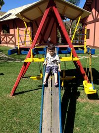 Full length of children playing in park