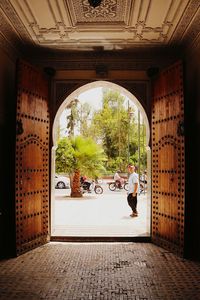 People in corridor of building