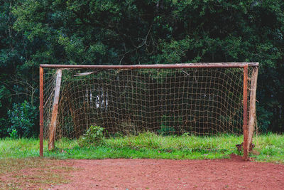 View of soccer field against trees