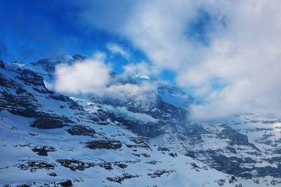 Winter landscape with hills covered with snow at jungfrau top of europe, switzerland