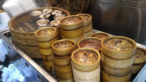 High angle view of bamboo steamers in container