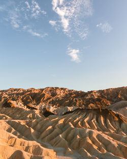 Scenic view of rock formations against sky