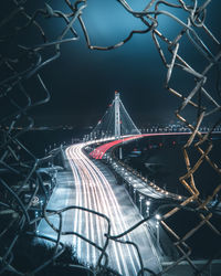 High angle view of light trails on bridge