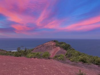 Scenic view of sea against sky at sunset