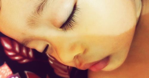 Close-up of boy sleeping