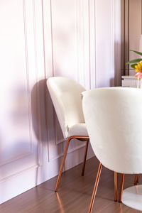 Modern empty chairs and table at home