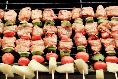 Close-up of meat on barbecue grill