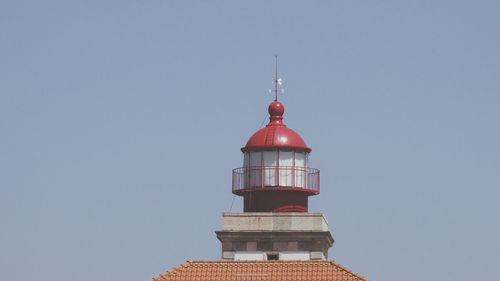 Low angle view of building against clear blue sky