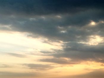 Low angle view of cloudy sky during sunset