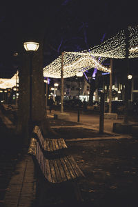 Illuminated lights hanging at night