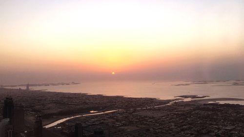 Scenic view of landscape against sky during sunset