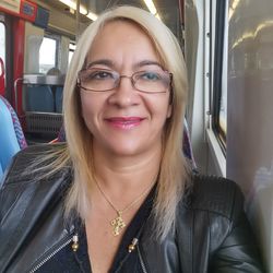 Portrait of smiling woman in bus