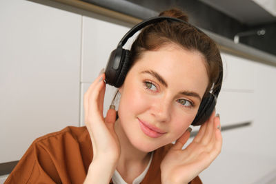 Young woman talking on phone