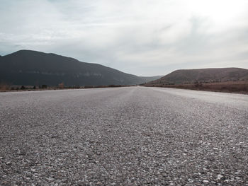 Surface level of road against sky