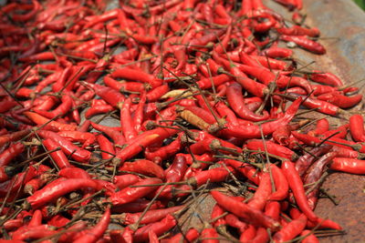 High angle view of red chili peppers for sale at market