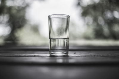 Close-up of glass of water on table