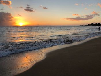 Scenic view of beach during sunset