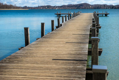 Wooden jetty on pier over lake