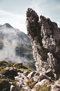 Scenic view of rocky mountains against sky