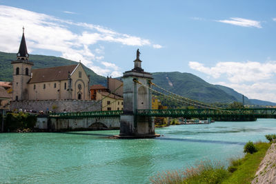 Bridge over river against sky