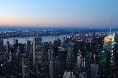 High angle view of modern buildings against sky in city