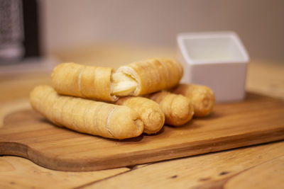 Close-up of bread on cutting board