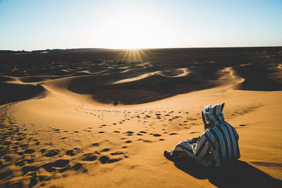 Scenic view of desert against clear sky