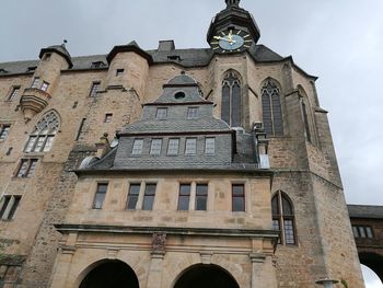 Low angle view of historic building against sky