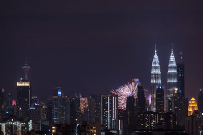 View of city lit up at night