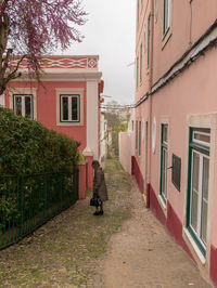 Street amidst buildings against sky