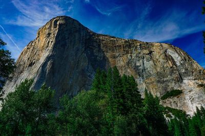 Low angle view of rocks against sky