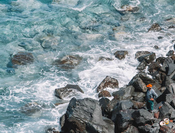 View of rocks in sea