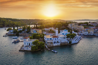 High angle view of townscape by sea