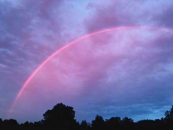 Low angle view of rainbow against sky